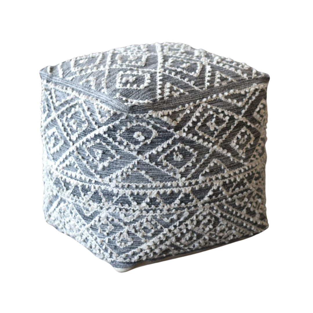 Angled view of the silver Birla Puff highlighting the raised geometric texture.
