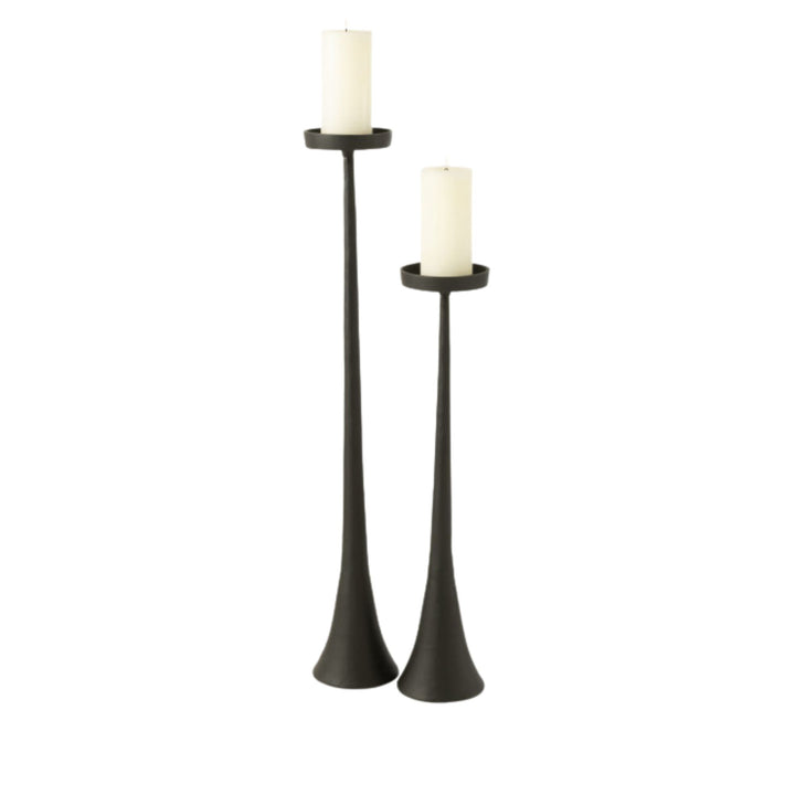 Group view of Black Candle Stands in two heights showcasing their slender metal silhouettes and matte black finish.