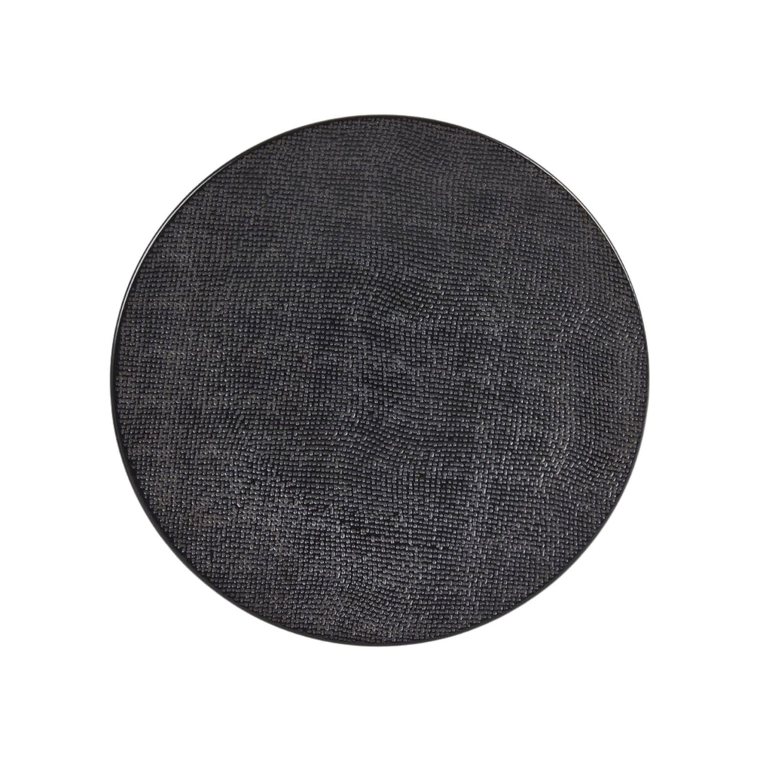 Top view of black ceramic plate with subtle textured surface.