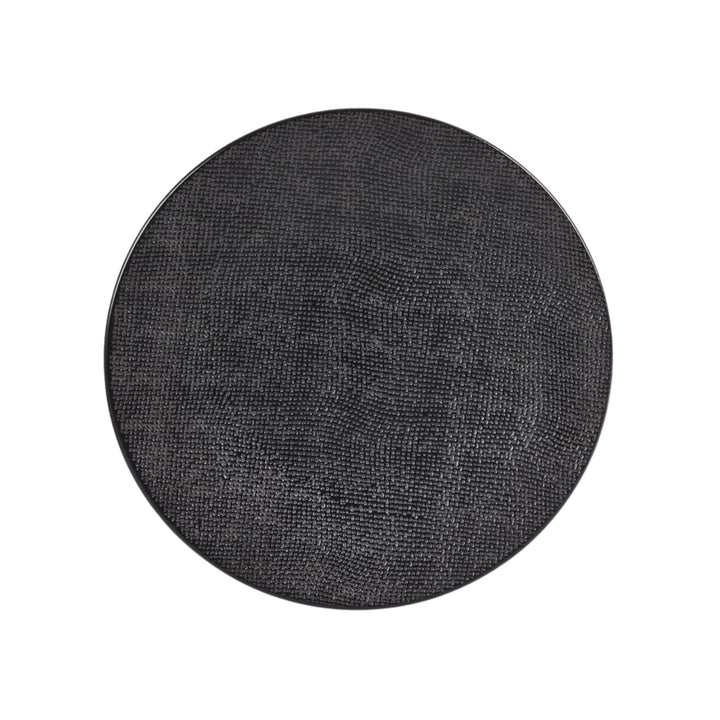 Top view of black ceramic plate with subtle textured surface.