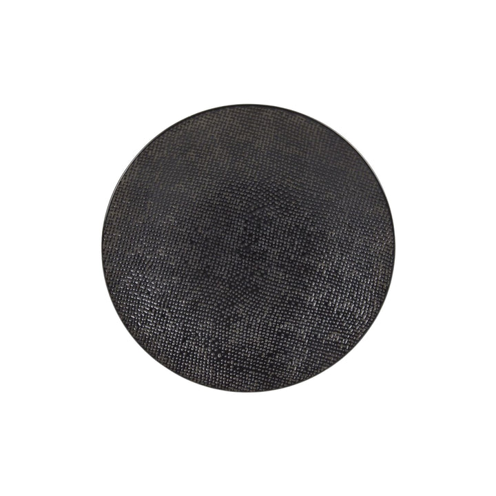 Top view of black ceramic dessert plate with subtle textured surface.