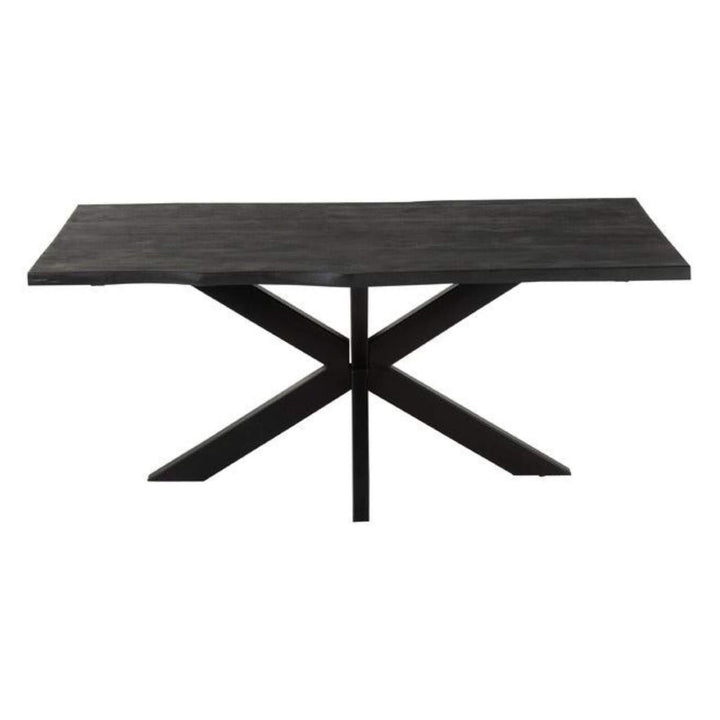 Side perspective of the Black Acacia Dining Table with black acacia wood top and metal base.