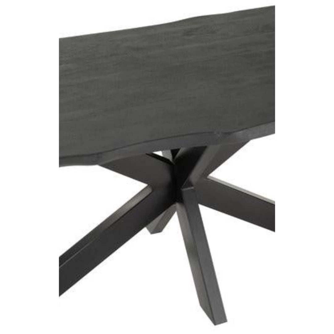 Detailed view of the tabletop texture of the Black Acacia Dining Table in black acacia wood.