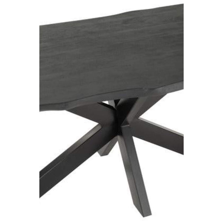Detailed view of the tabletop texture of the Black Acacia Dining Table in black acacia wood.