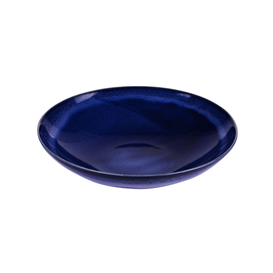 Side view of blue ceramic bowl highlighting depth and smooth handcrafted finish.