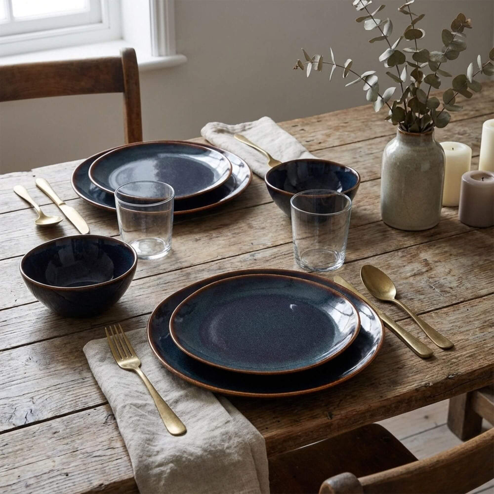 Styled dining table featuring Blue Symphony ceramic dinnerware collection.