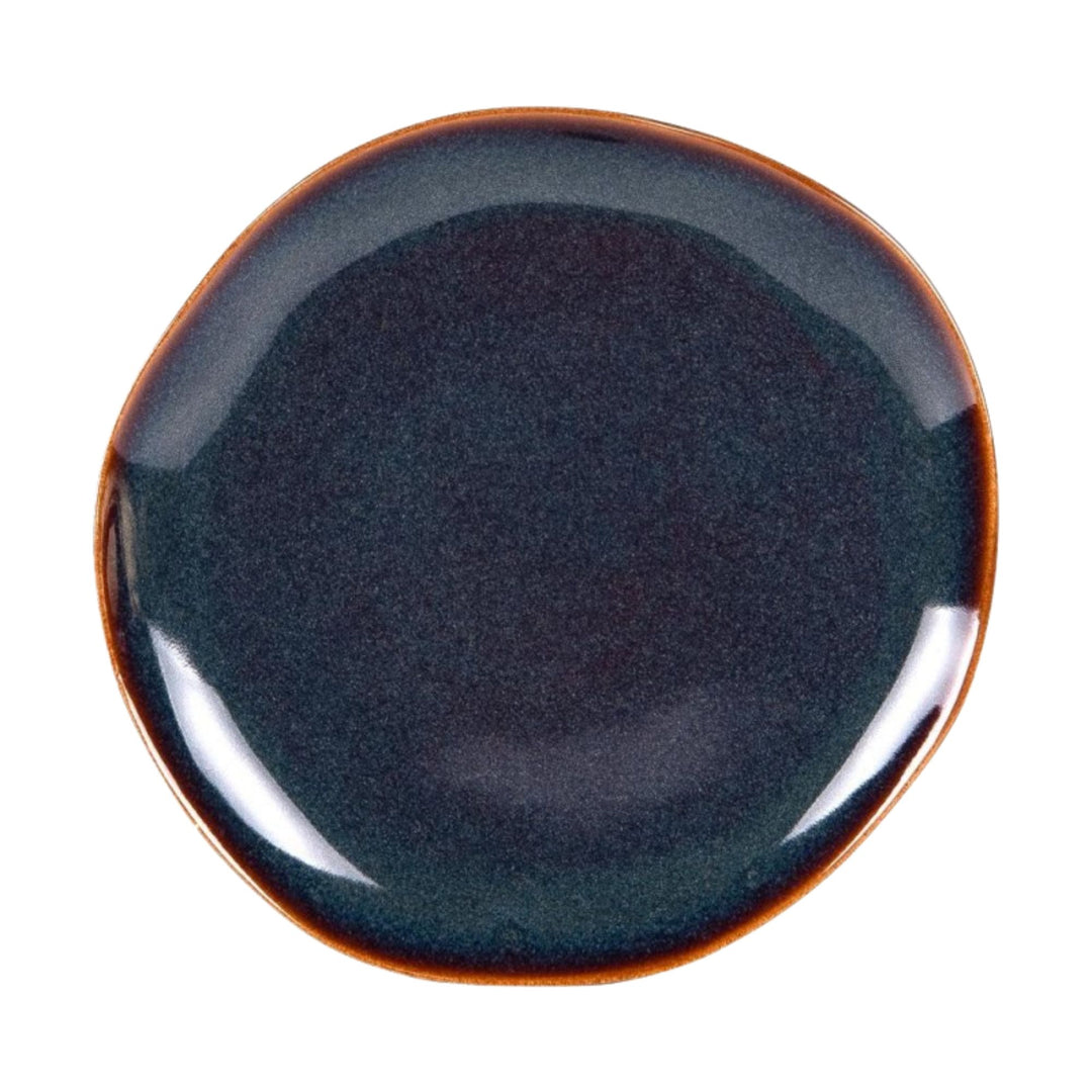Top view of Blue Symphony ceramic plate with rich blue finish and contrast edge.