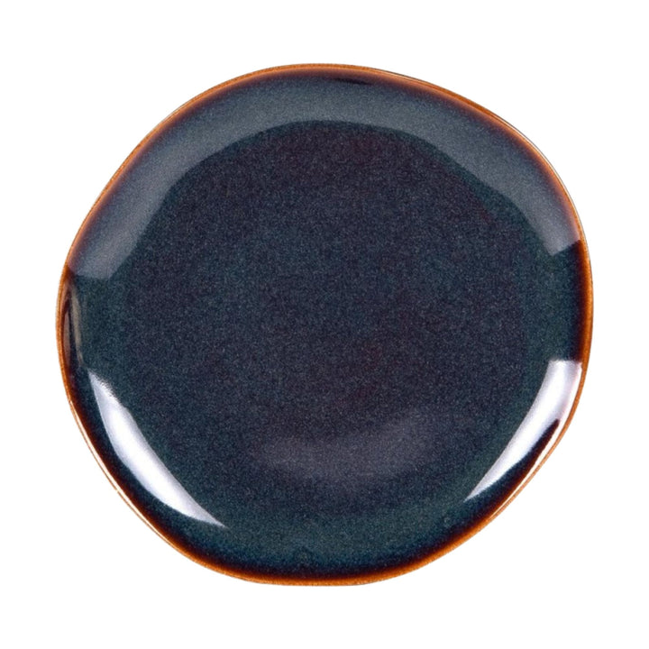 Top view of Blue Symphony ceramic plate with rich blue finish and contrast edge.