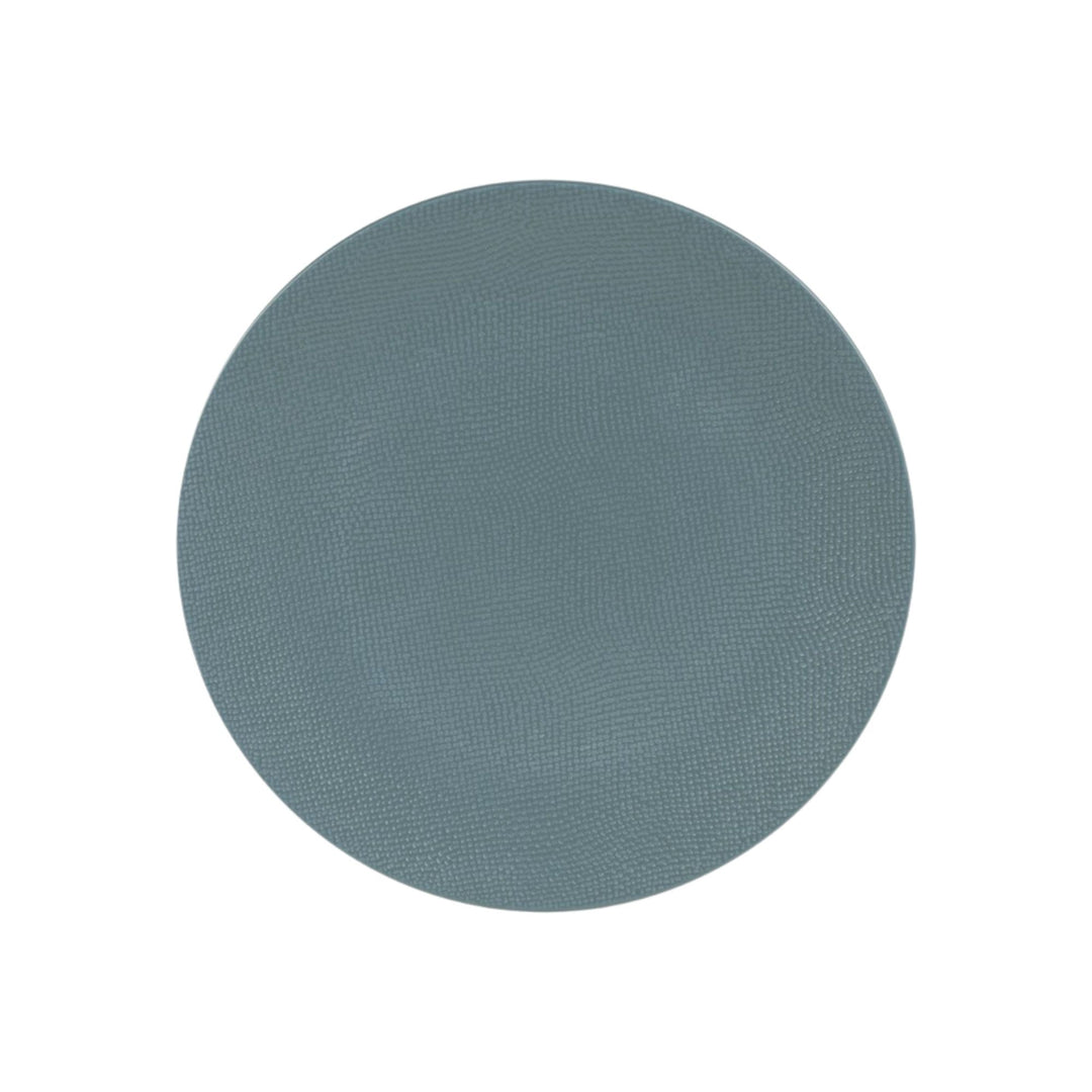 Top view of blue ceramic plate with subtle textured surface.