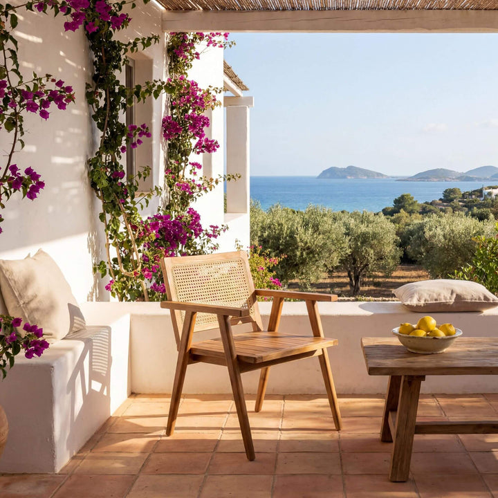 Styled terrace setting featuring the Bora Bora armchair in a relaxed Mediterranean outdoor space.
