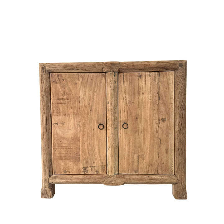 Front view of Borgo teak buffet showing its compact two-door design in recycled teak wood.