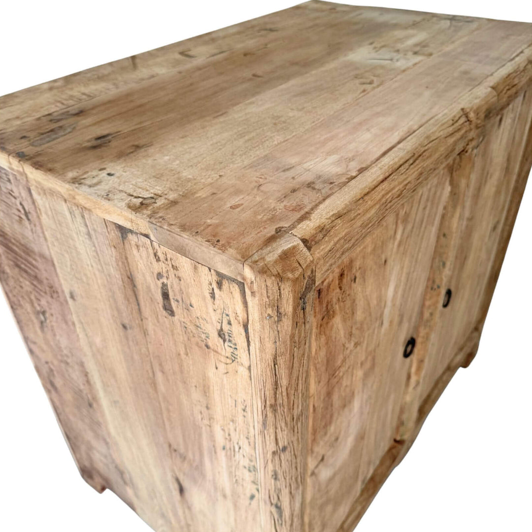 Side panel view of the Borgo Teak Buffet showing natural variations in teak.