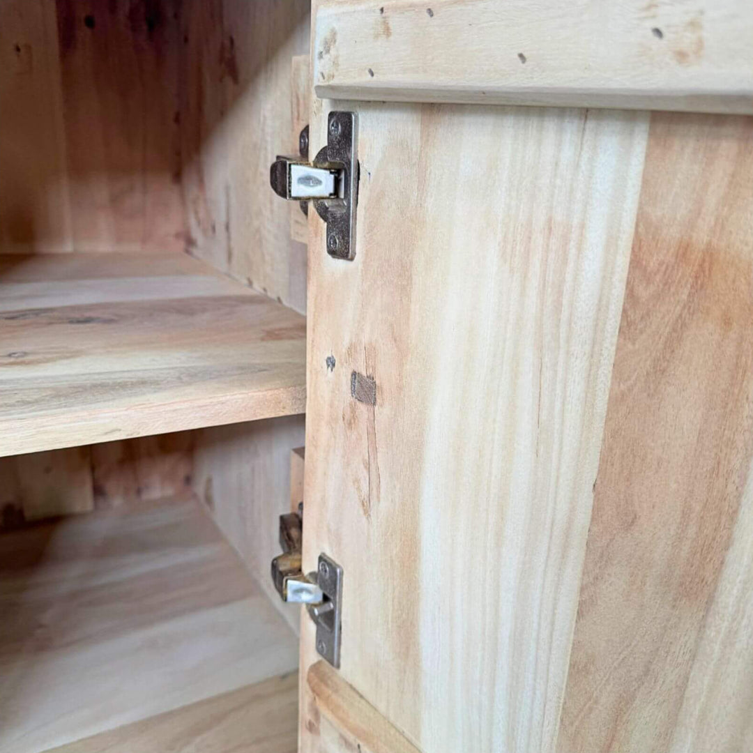 Close-up of the Borgo Teak Buffet interior shelving in solid teak wood.