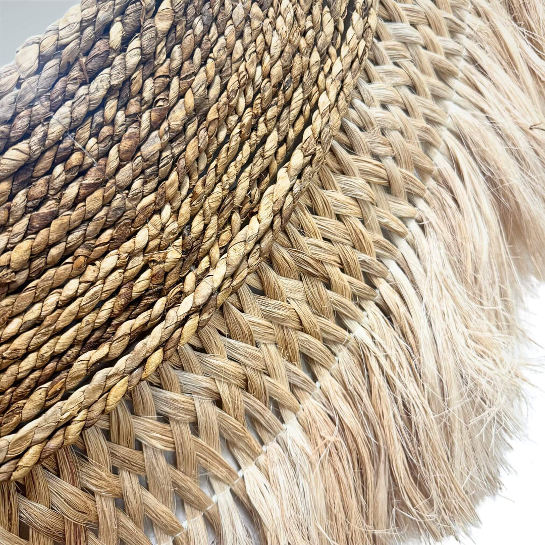 Close-up detail of banana fiber and sisal weaving highlighting the handcrafted texture.
