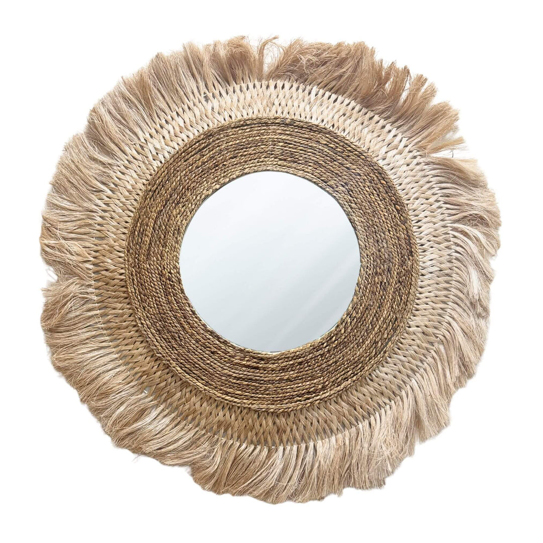 Front view of Borobudur mirror showcasing its circular shape and natural fiber fringe.