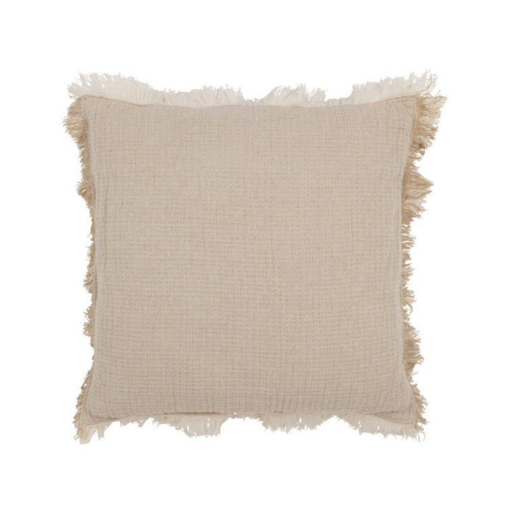 Brisa Cushion Beige showing textured cotton fabric and fringe edges front view.