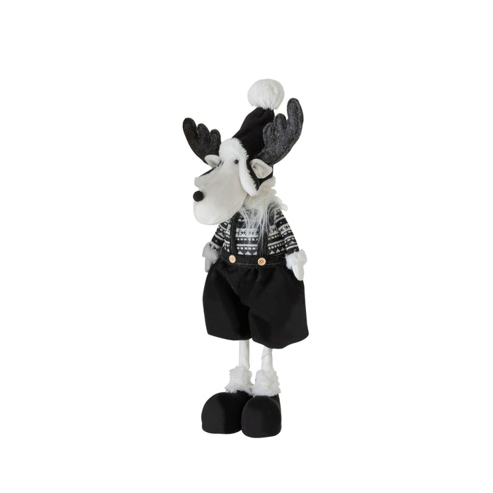 Standing view of the Broms Deer deco ornament with black trousers and winter details.