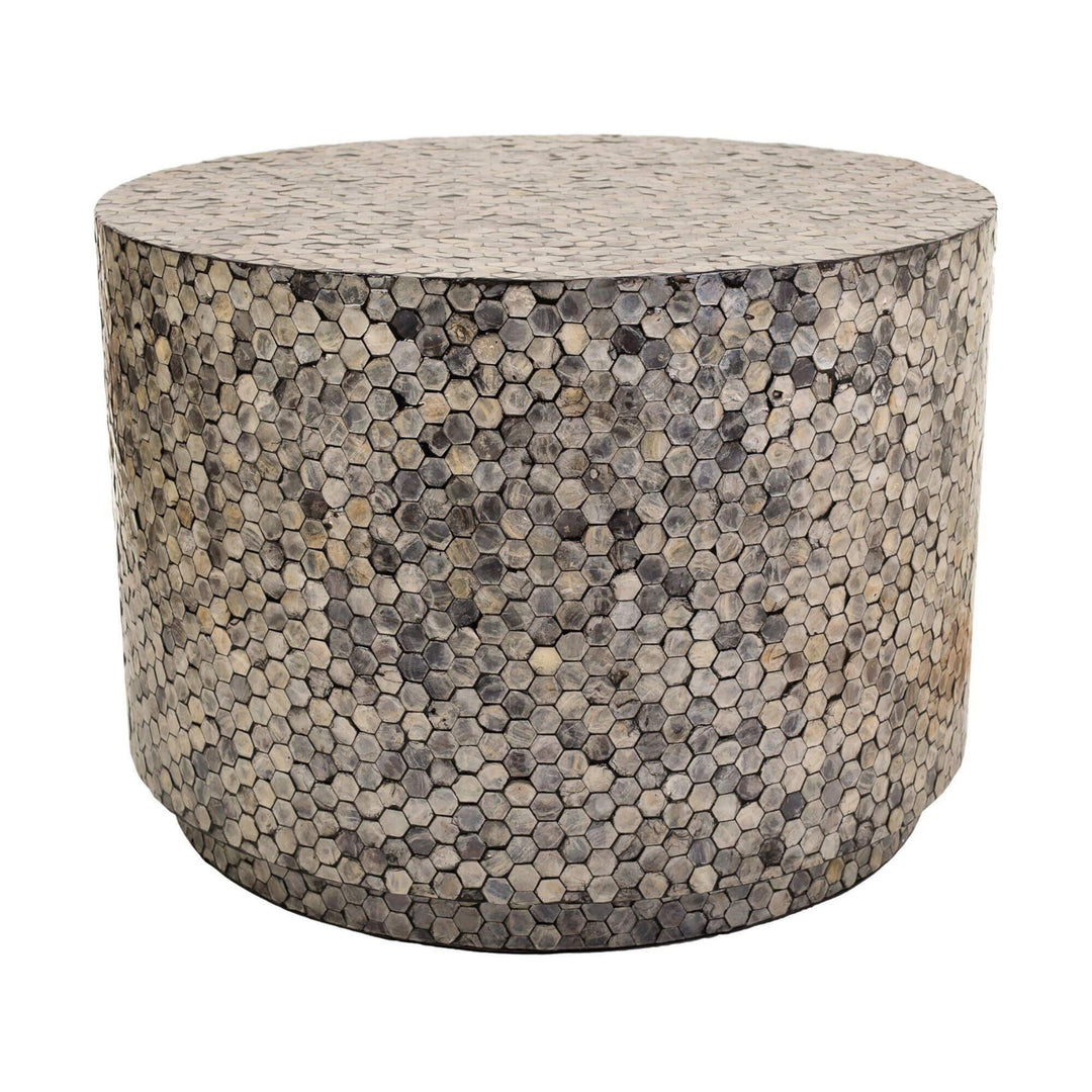 Angled view of the Bruma Coffee Table displaying grey capiz detailing and handcrafted texture.