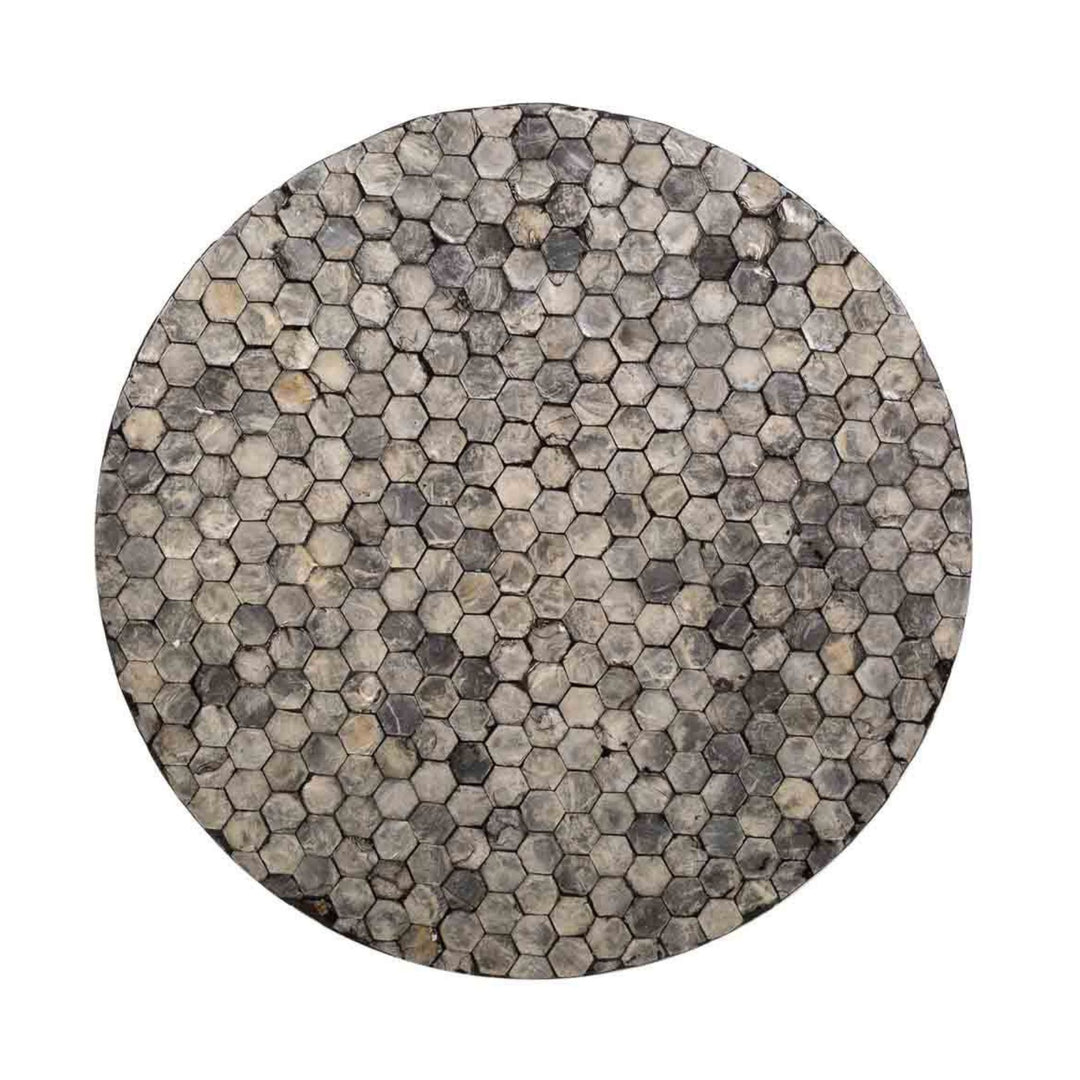 Top view of the Bruma Stool Grey Capiz showing its hexagonal shell mosaic surface.