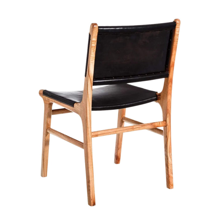 Rear view of Buffalo dining chair showing leather backrest and teak legs