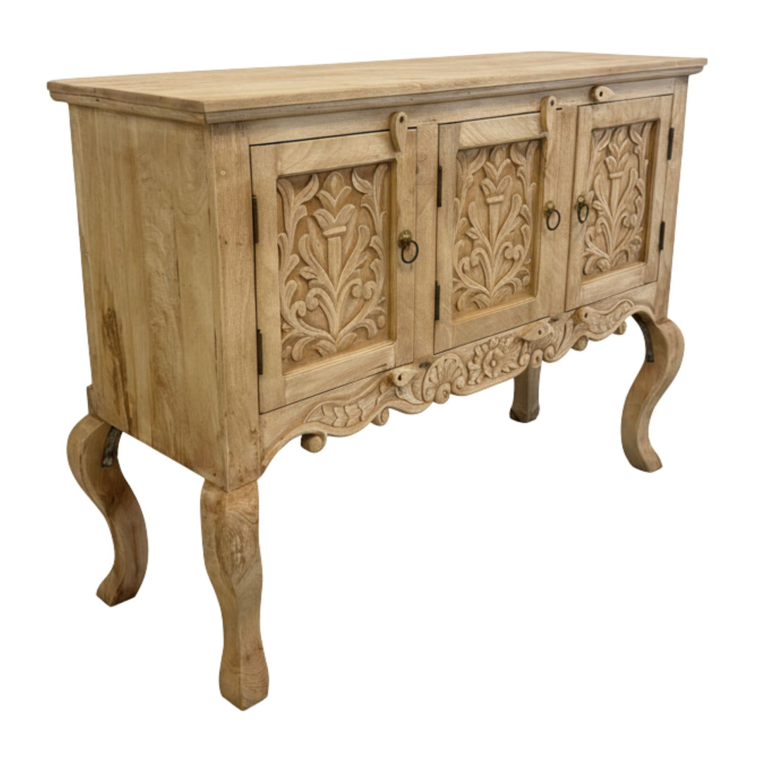 Side angle of the Buffet White Briss Collection showcasing carved legs and panels.