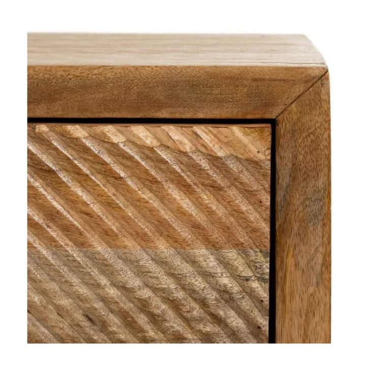 Detail of Bulan bedside table drawer joinery and carved texture