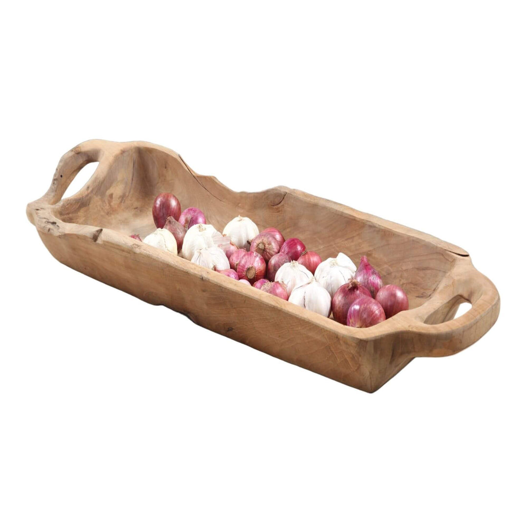 Buni teak tray filled with garlic and onions showing hand-carved solid teak wood shape