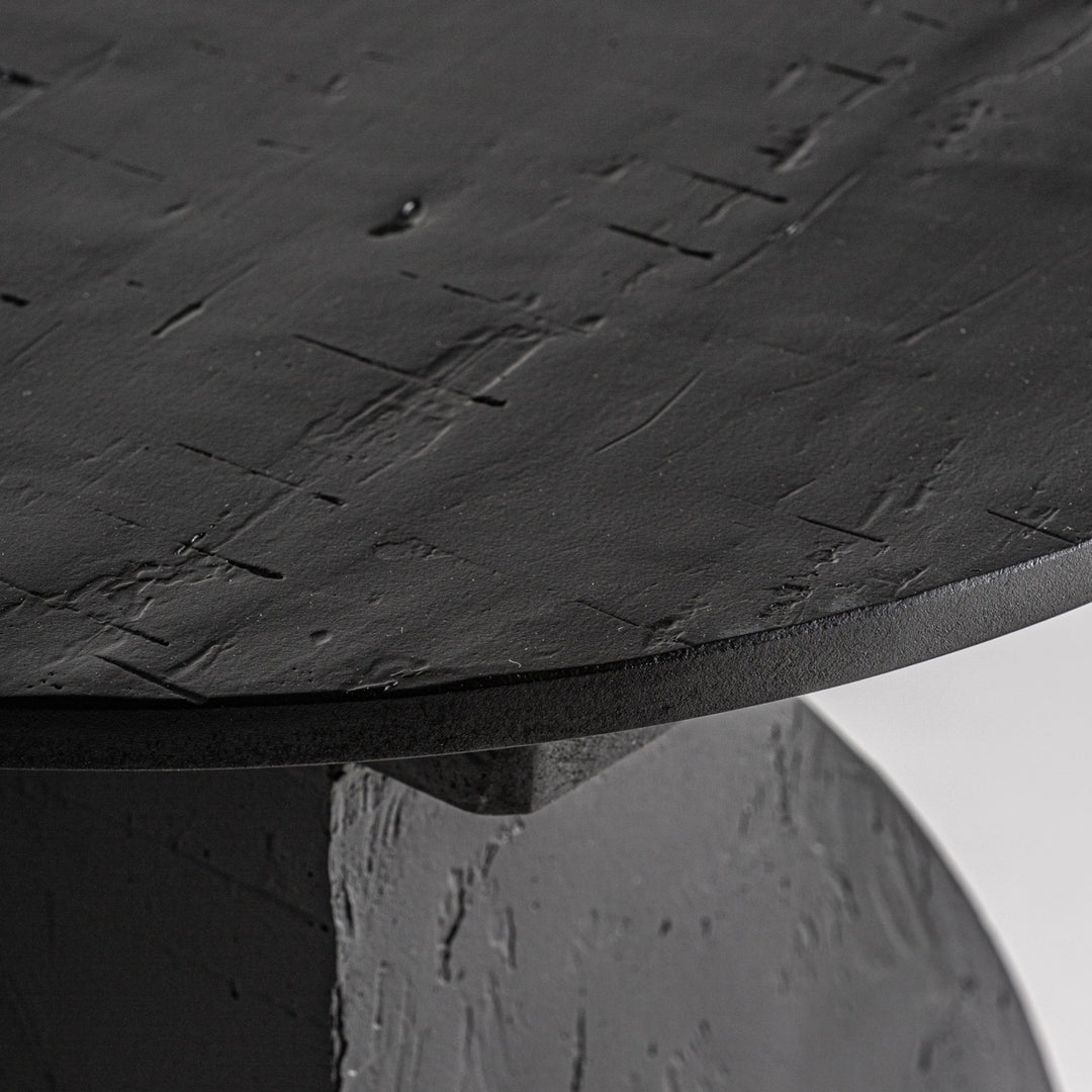 Close-up detail of the textured mango wood surface of the Burleigh side table.