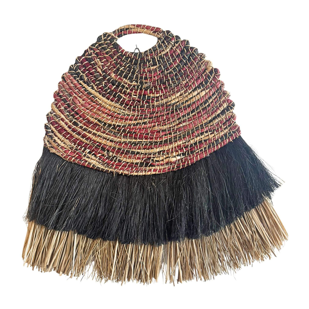 Bayu Wall Deco, handwoven from abaca, cotton, and rattan with natural and black fringe in earthy tones.