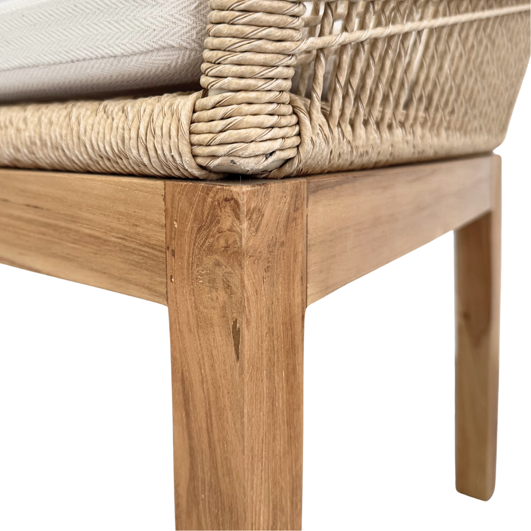 Close-up of teak leg and seat detail on Biyadhoo Dining Chair