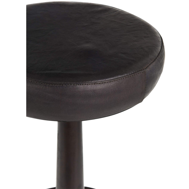 Close-up of round dark brown leather seat on Buffalo Bar Stool