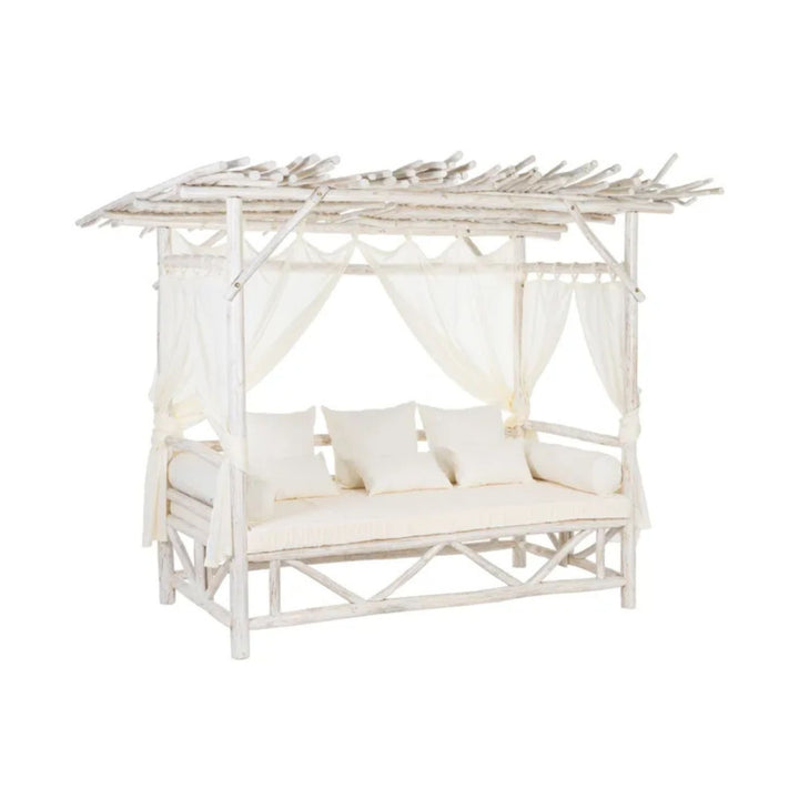 Cahya outdoor teak daybed styled as a tropical relaxation lounge