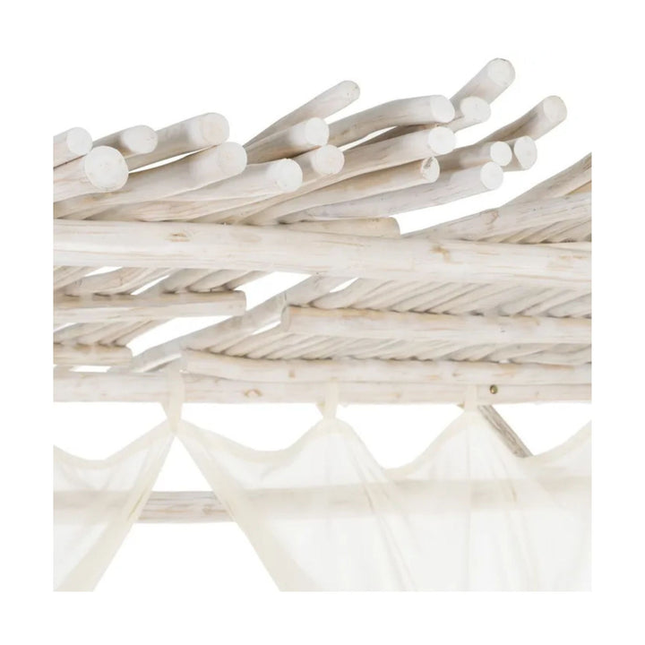 Cahya teak daybed angled view highlighting roof structure and flowing curtains