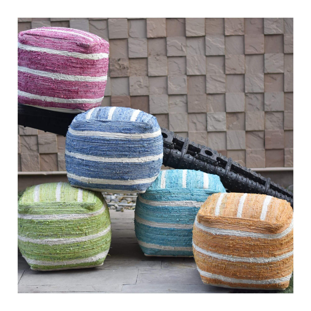 Cala cotton puff assortment showing woven striped design in multiple colors stacked together