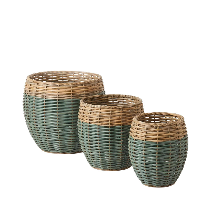 Front view of the Cala woven baskets showing the three available sizes and two-tone natural and green finish.