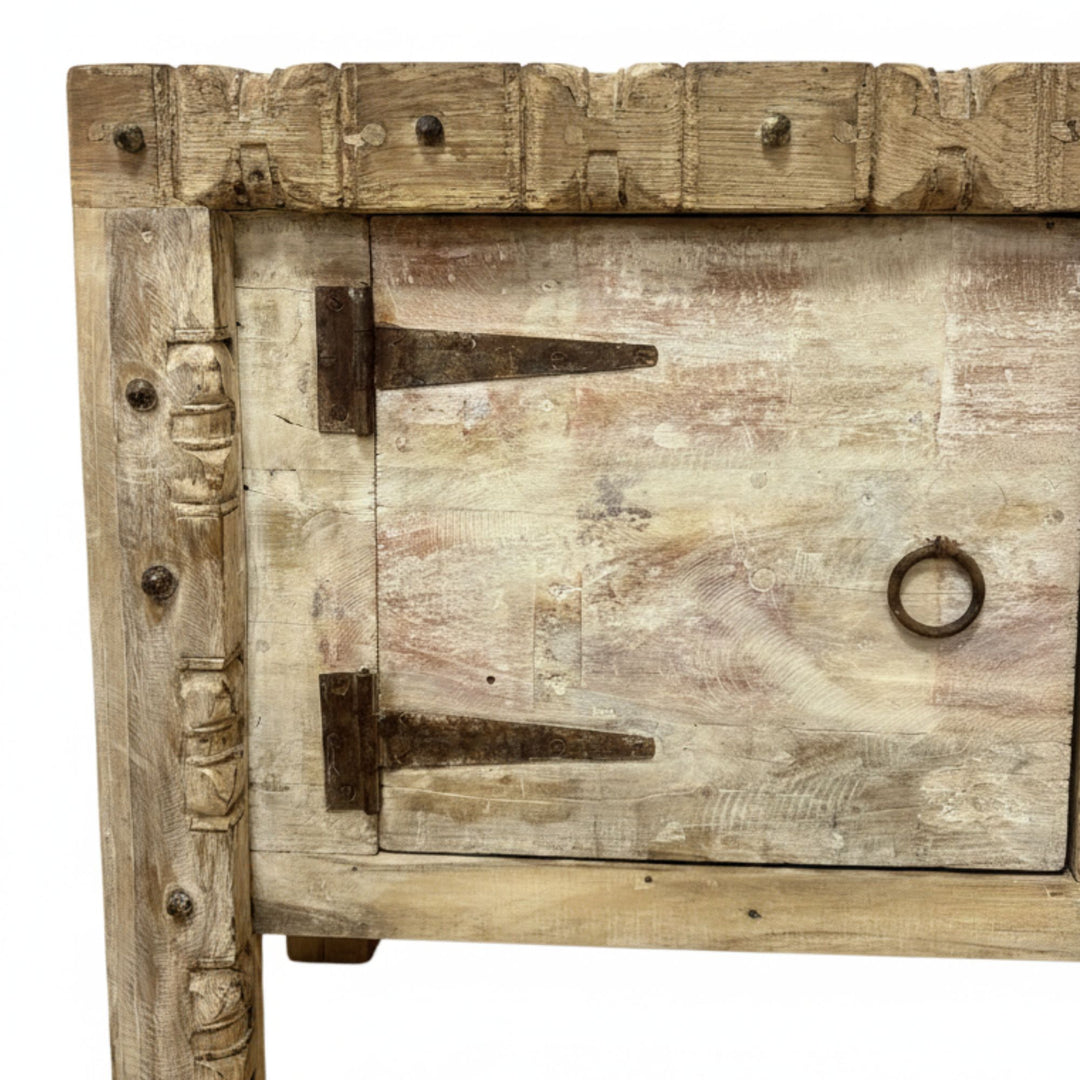 Close-up of the handcrafted reclaimed wood panels on the Camtha Buffet.