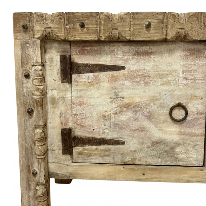 Close-up of the handcrafted reclaimed wood panels on the Camtha Buffet.