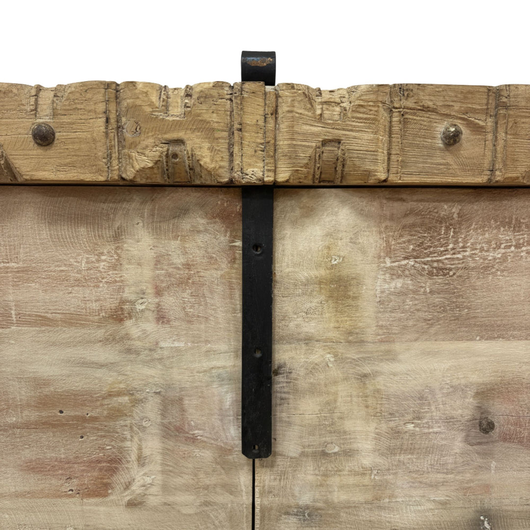 Close-up of the handcrafted reclaimed wood panels on the Camtha Buffet.