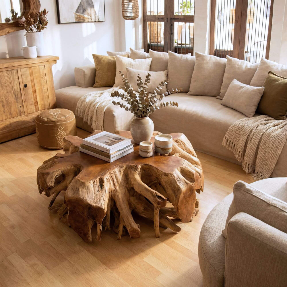 Styled living room setting featuring the Canggu coffee table as a statement piece in a warm natural interior.