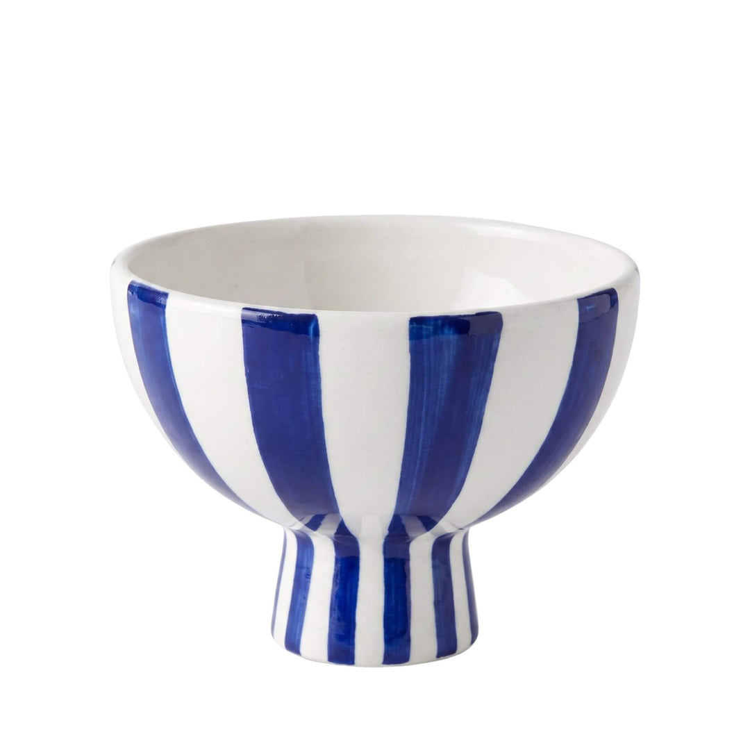 Front view of the Capri pedestal bowl showing its blue and white striped ceramic design and raised base.