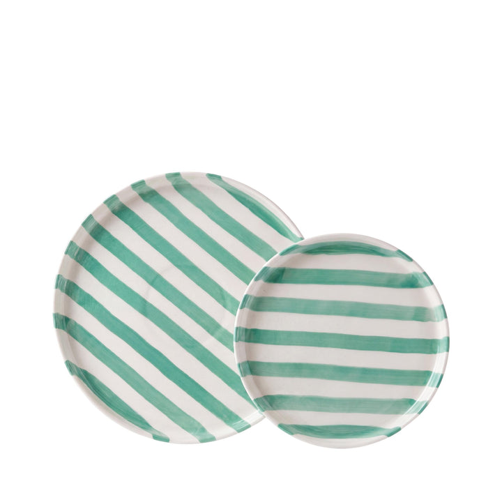 Front view of the Capri Stripes plates showing the two available sizes with hand-painted green and white stripes.