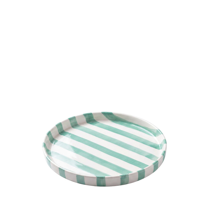Front view of the smaller Capri Stripes plate showing its soft green diagonal striped ceramic design.