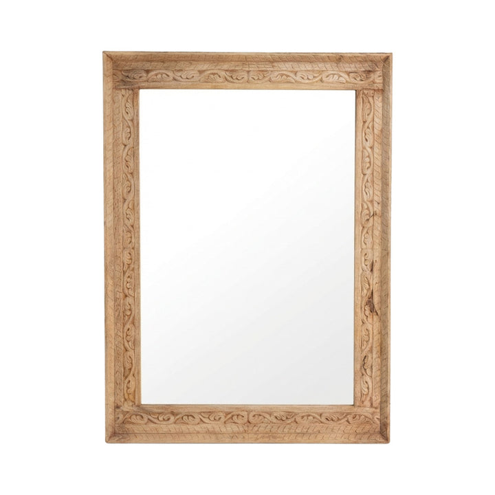 Front view of the White Briss carved mirror showcasing its rectangular hand-carved sheesham wood frame.