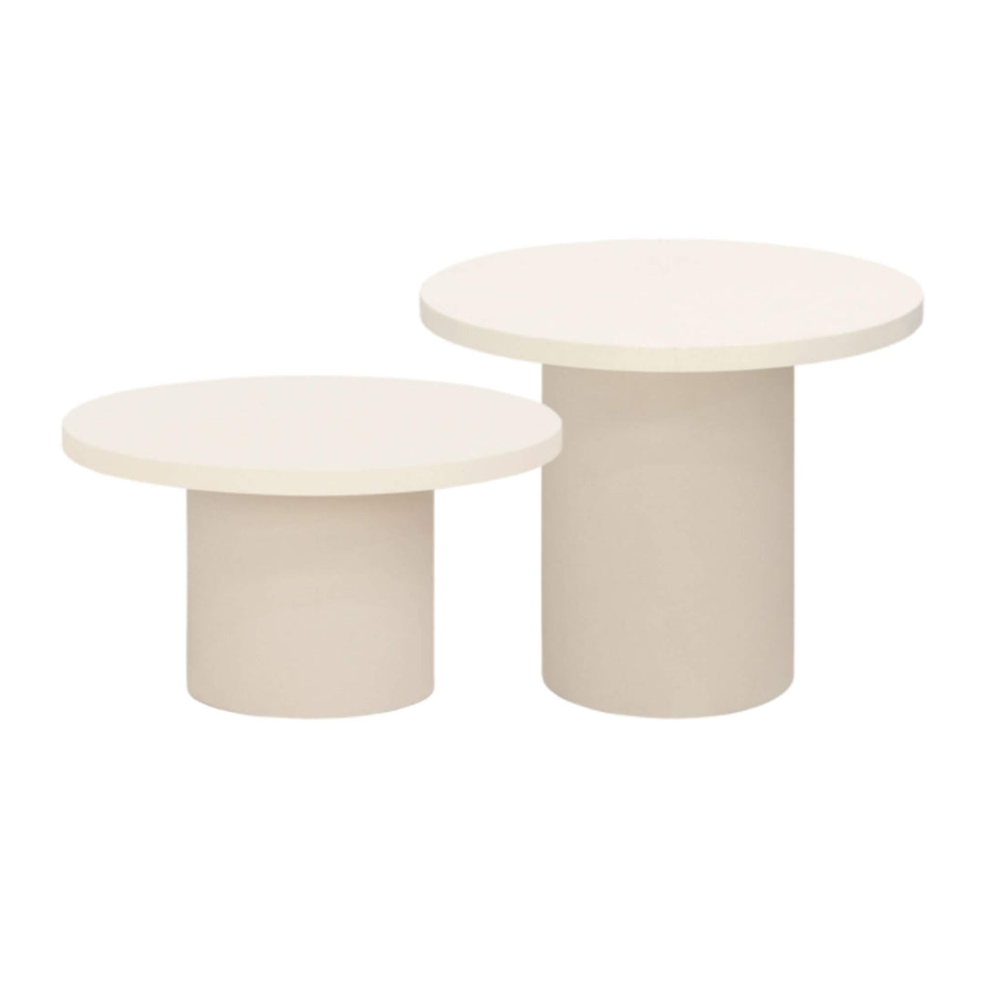 Set of round off-white microcement coffee tables in two heights