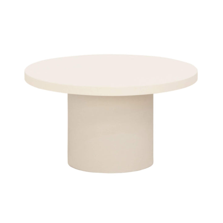 Off-white round microcement coffee table with cylindrical base
