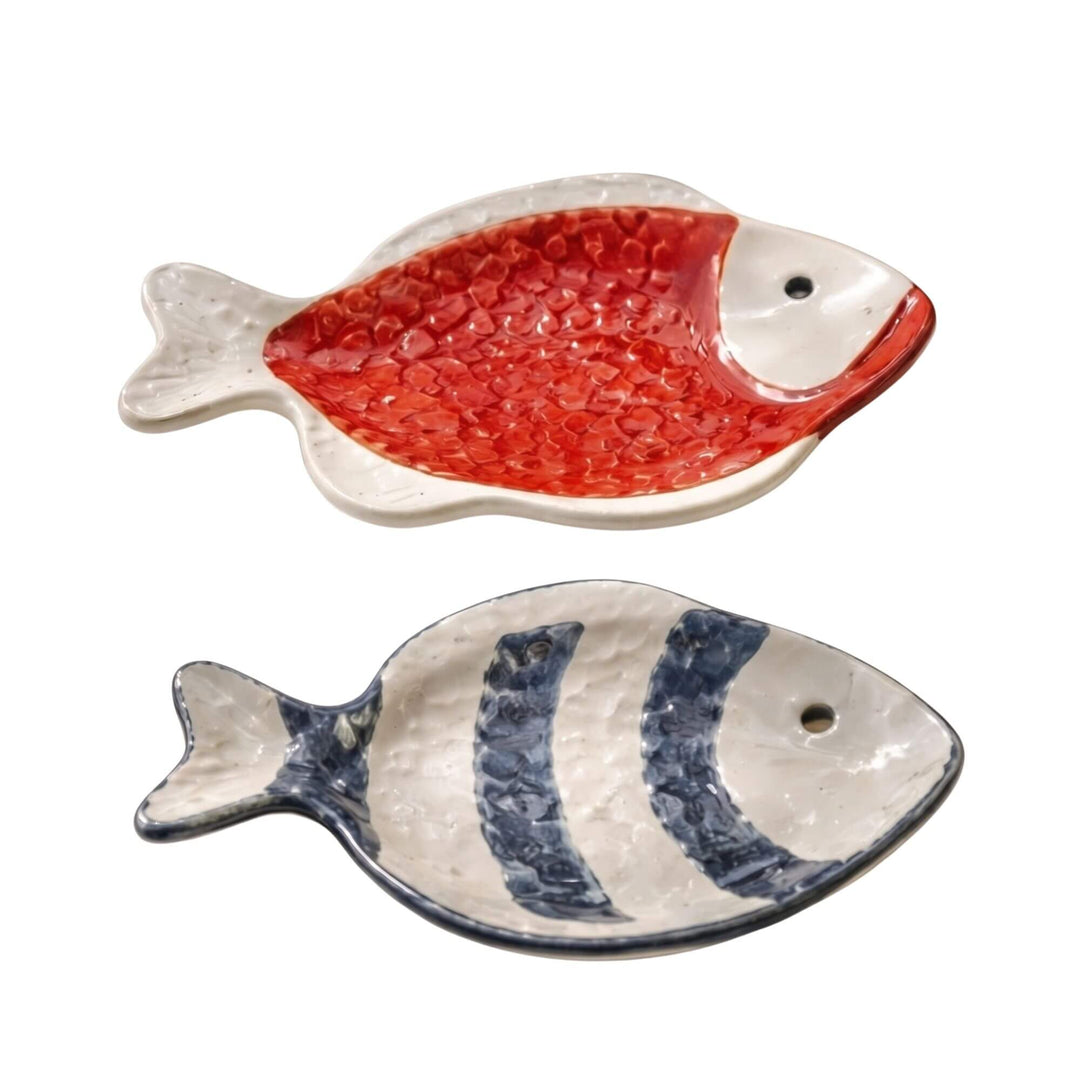 Set of ceramic fish serving platters in different glazed colors with handcrafted finish.