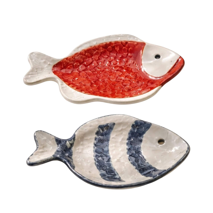 Set of ceramic fish serving platters in different glazed colors with handcrafted finish.