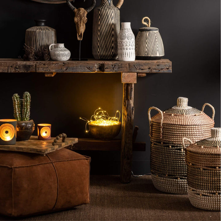 Rustic entryway setup featuring Chiang console table with decorative vases
