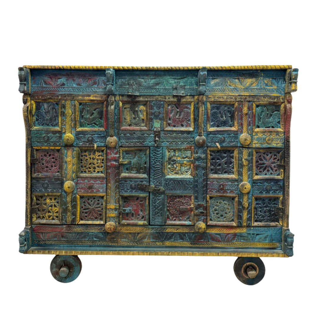 Front view of the Chopta Wheels Buffet with intricate multicolored carved panels.