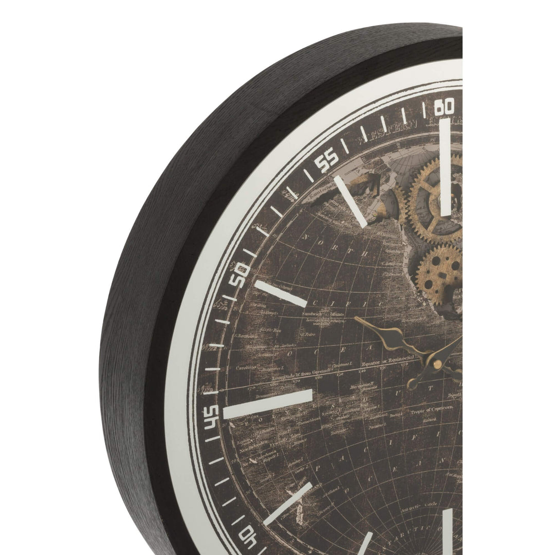Close-up detail of the clock face highlighting the world map design and decorative gears.